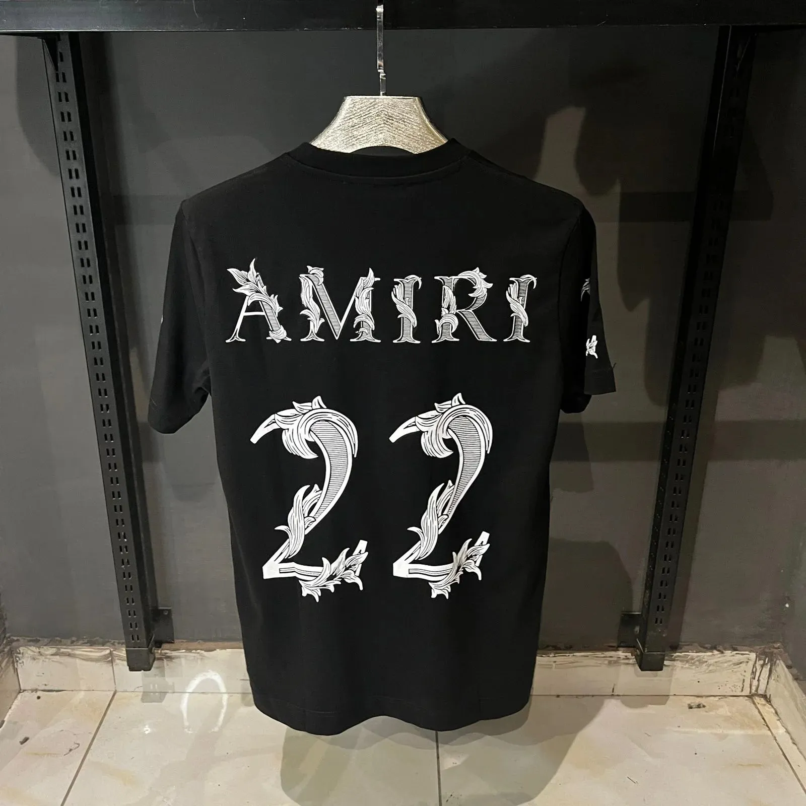 Amiri 22 logo-print cotton T-shirt - The Nucleus Clothing